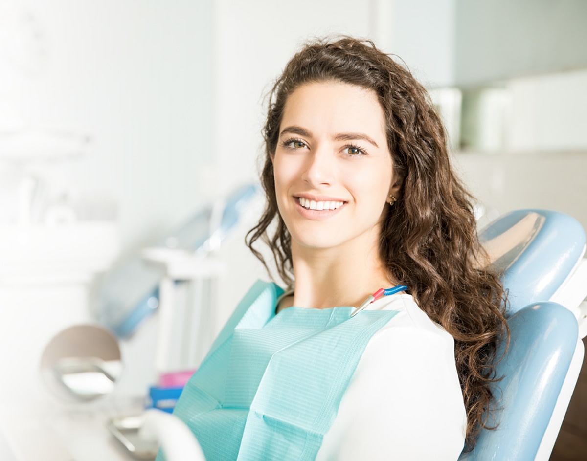 Woman smiling in dentist chair